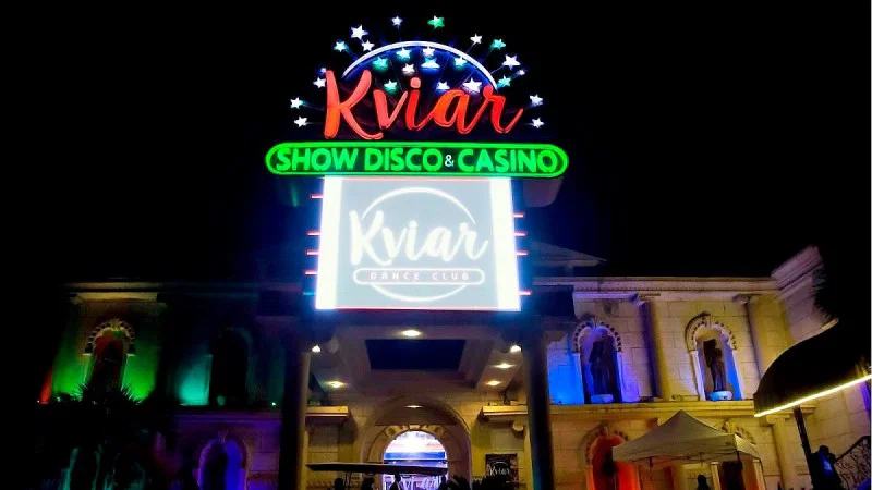 Kviar Show Disco and Casino entrance at night in Cofresi